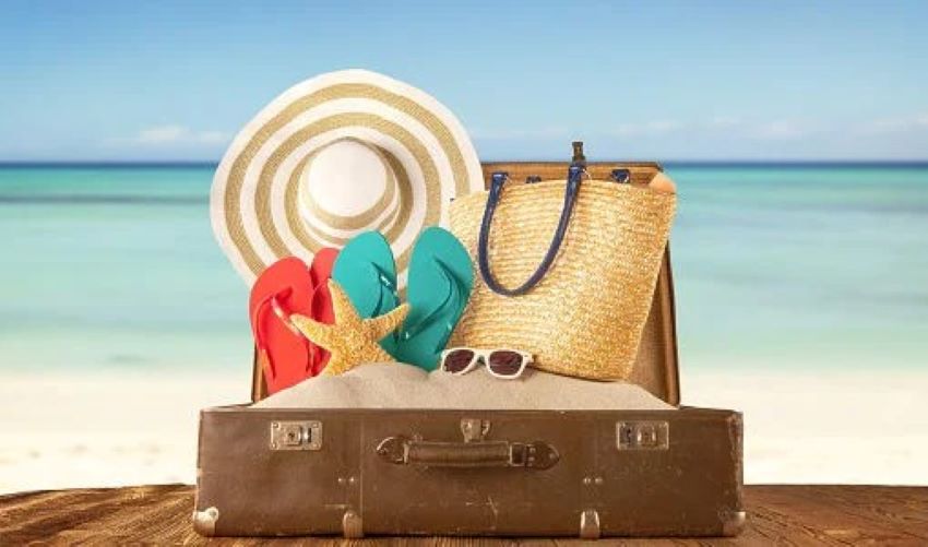 Traveler planning a short trip itinerary on a laptop with a tight schedule